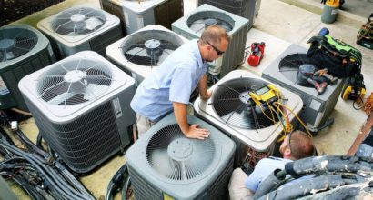 service-workers-are-testing-the-old-air-conditioners-before-installing-the-new-one_t20_wQWJk0